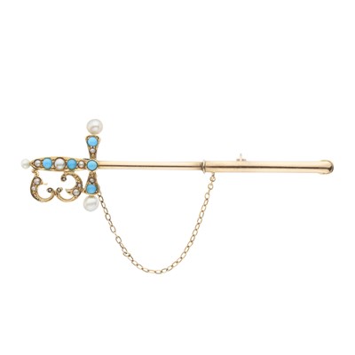 Lot 133 - An Edwardian gold turquoise and pearl sword jabot pin