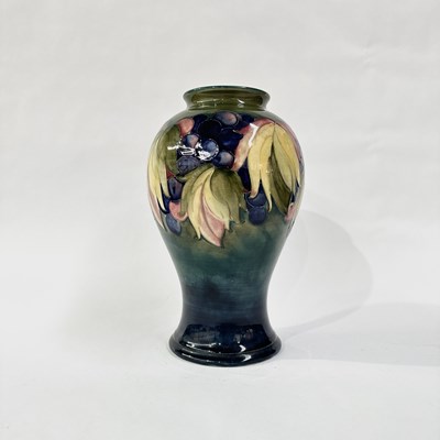 Lot 754 - William Moorcroft, 'Leaf and Berries' vase,...