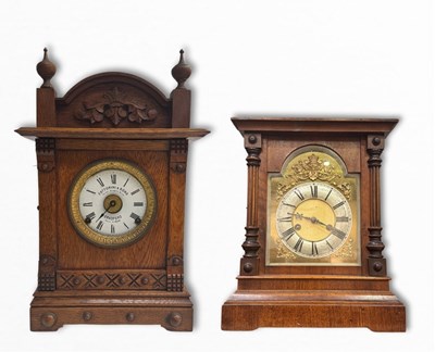 Lot 349 - Clocks: a H.A.C 14-day strike oak mantle clock...