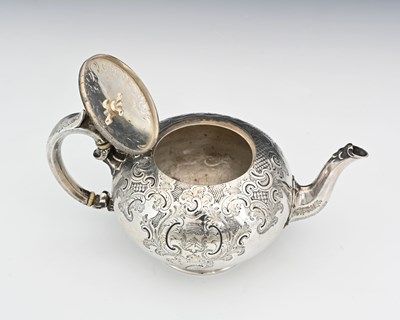 Lot 57 - A Victorian silver teapot, of globular form,...