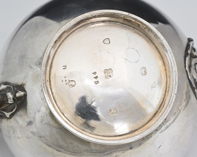 Lot 57 - A Victorian silver teapot, of globular form,...