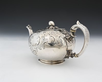 Lot 57 - A Victorian silver teapot, of globular form,...
