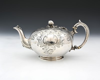 Lot 57 - A Victorian silver teapot, of globular form,...