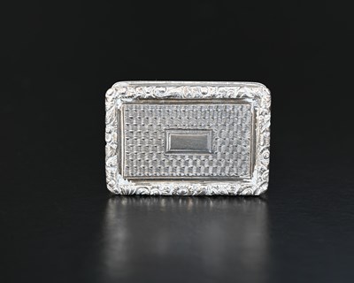 Lot 196 - A George IV silver vinaigrette, of rectangular...