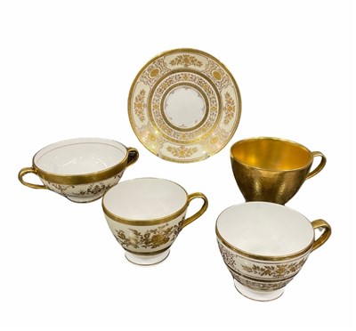 Lot 771 - A collection of gilded Minton teawares,...