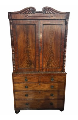 Lot 940 - A Regency mahogany linen press cabinet with...