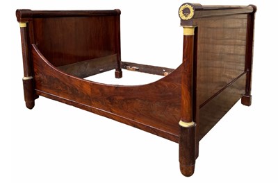 Lot 874 - A 19th century mahogany Empire bed with ormolu...