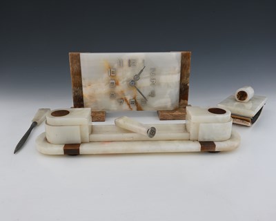 Lot 283 - An Art Deco onyx desk set, circa 1930, black...