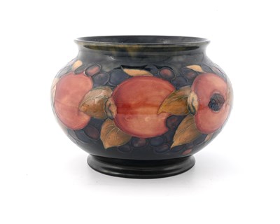 Lot 720 - William Moorcroft, a Pomegranate footed bowl,...