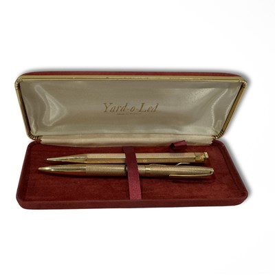 Lot 687 - A 9ct gold 'Yard-o-Lead' biro and a rolled...