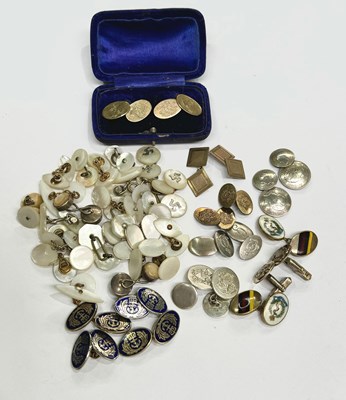 Lot 584 - Two pairs of blue enamel cufflinks with naval...