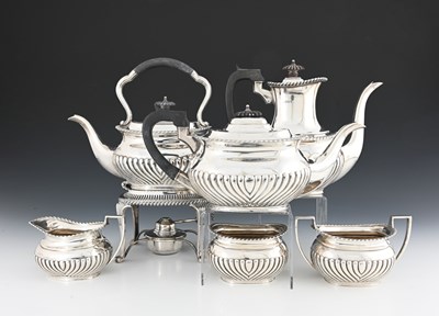 Lot 232 - A George V silver six-piece tea and coffee...