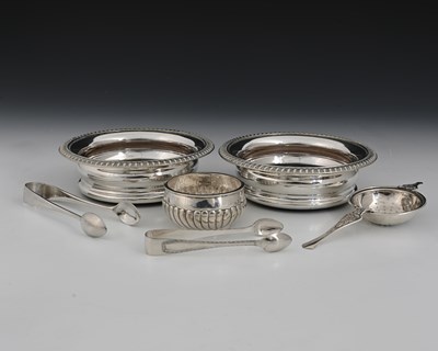 Lot 180 - An American Art Nouveau silver tea strainer,...