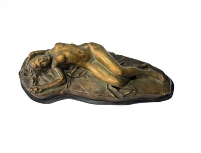 Lot 181 - A plaster model of a nude recumbent woman,...