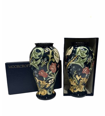 Lot 766 - Moorcroft, a pair of 'Golden Lily' vases, tube...