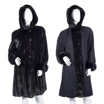 Lot 505 - A reversible black mink hooded coat.