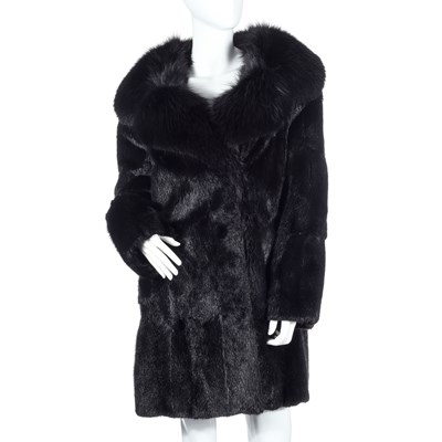 Lot 513 - A black musquash fur coat with fox fur collar.