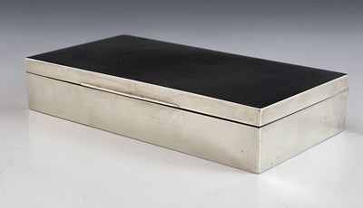 Lot 47 - A George V silver cigarette box, F H Adams, Birmingham 1935