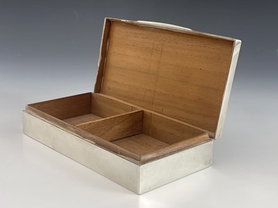 Lot 47 - A George V silver cigarette box, F H Adams, Birmingham 1935