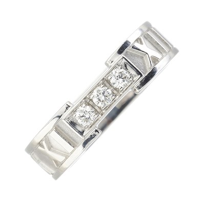 Lot 104 - Tiffany & Co., an 18ct gold diamond Atlas band ring