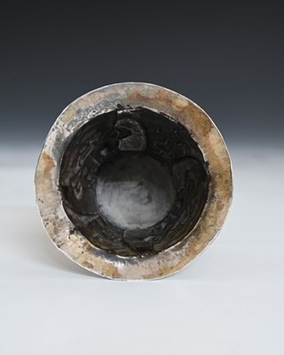 Lot 19 - A South American silver-coloured metal vase,...