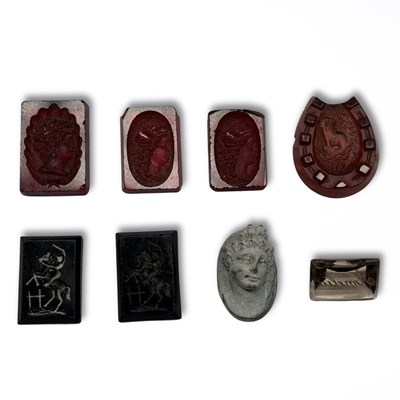 Lot 668 - A small collection of loose intaglio seals...