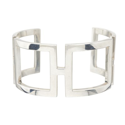 Lot 9 - Tiffany & Co., a silver square cut out cuff bangle bracelet