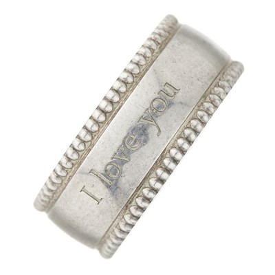 Lot 21 - Tiffany & Co., a silver Yours I Love You beaded edge band ring