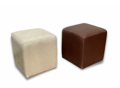 Lot 911 - Two Alma calf leather ottomans in cream and...