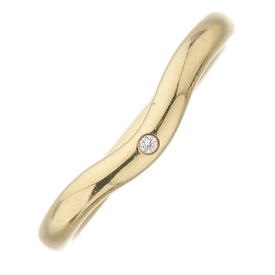 Lot 33 - Elsa Peretti for Tiffany & Co., an 18ct gold diamond single-stone wedding band ring