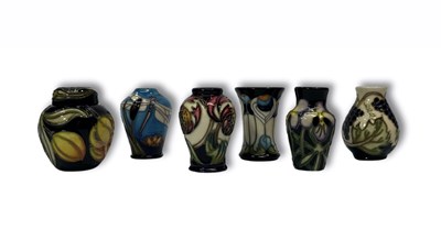 Lot 759 - Moorcroft: a set of six miniature vessels of...