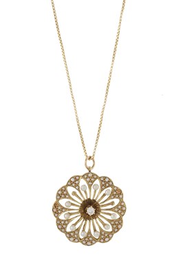 Lot 138 - An Edwardian gold pearl and diamond flower pendant, with chain