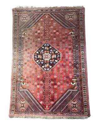 Lot 581 - Persian wool rug, red ground, attrib. Shiraz...