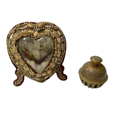 Lot 410 - A heart-shaped sailors' valentine wall plaque...