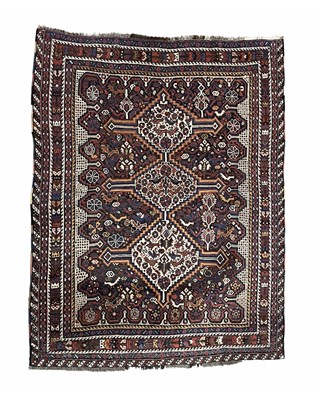 Lot 357 - A Khamseh rug, circa 1910, the three cream...