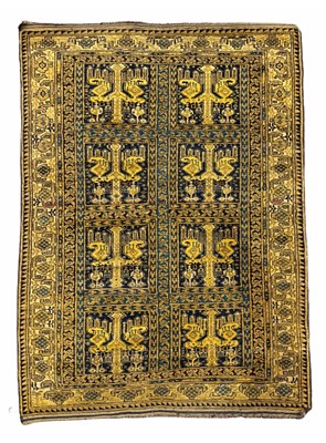 Lot 347 - An Afghan tribal rug, yellow ground, the eight...