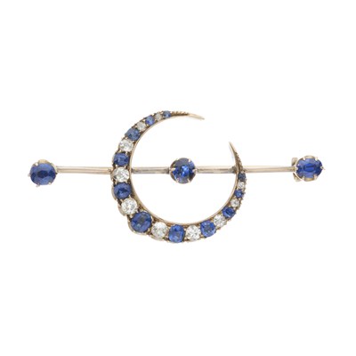 Lot 141 - A late Victorian gold sapphire and diamond crescent brooch