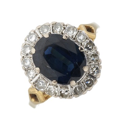 Lot 77 - A mid 20th century 18ct gold sapphire and diamond cluster ring