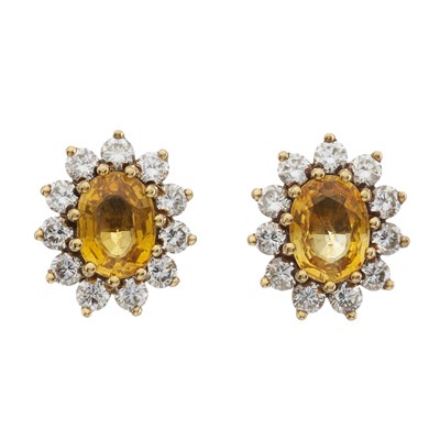 Lot 41 - A pair of 18ct gold yellow sapphire and diamond cluster stud earrings