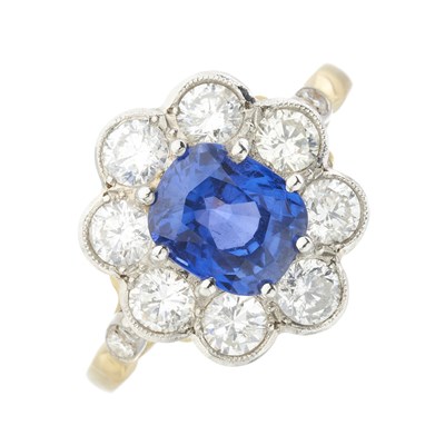 Lot 156 - An 18ct gold sapphire and diamond cluster ring