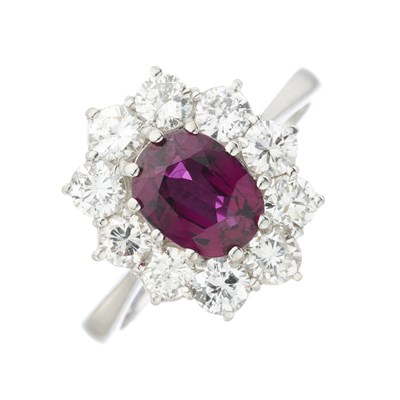 Lot 50 - An 18ct gold ruby and diamond cluster ring