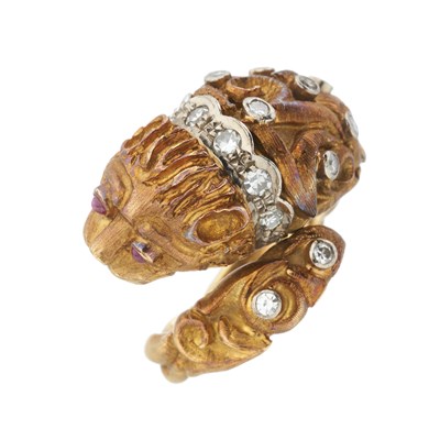 Lot 100 - Zolotas, an 18ct gold diamond and pink sapphire lion's head ring