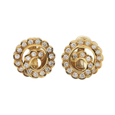 Lot 60 - A pair of 18ct gold diamond swirl clip earrings