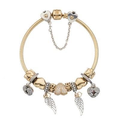 Lot 93 - Pandora, a 14ct gold and silver charm bracelet