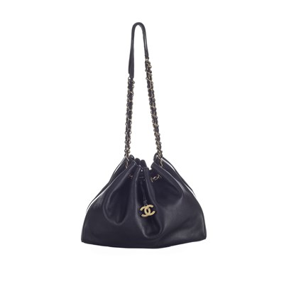 Lot 331 - Chanel, a black leather drawstring tote w/pouch