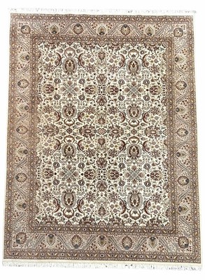 Lot 579 - A large Persian rug, central white ground with...