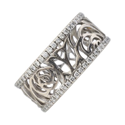 Lot 119 - Chanel, an 18ct gold diamond Camelia Ajoure full eternity ring