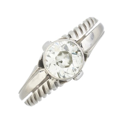 Lot 40 - A mid 20th century diamond single-stone band ring