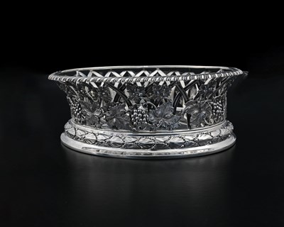 Lot 146 - A George V silver pierced basket or dish, of...