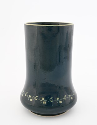 Lot 751 - Ruskin Pottery, a Souffle glazed vine painted...